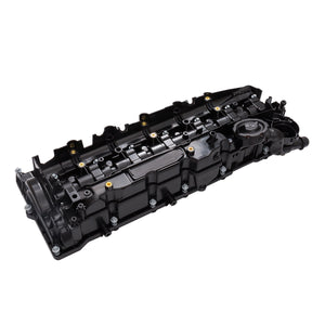 Close-up view of the underside of the BMW N47 valve cover showing the integrated gasket and PCV system