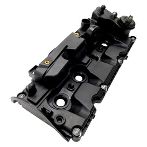 Fuel injector ports and precision mounting bolt holes on Audi 2.0 TDI cylinder head cover