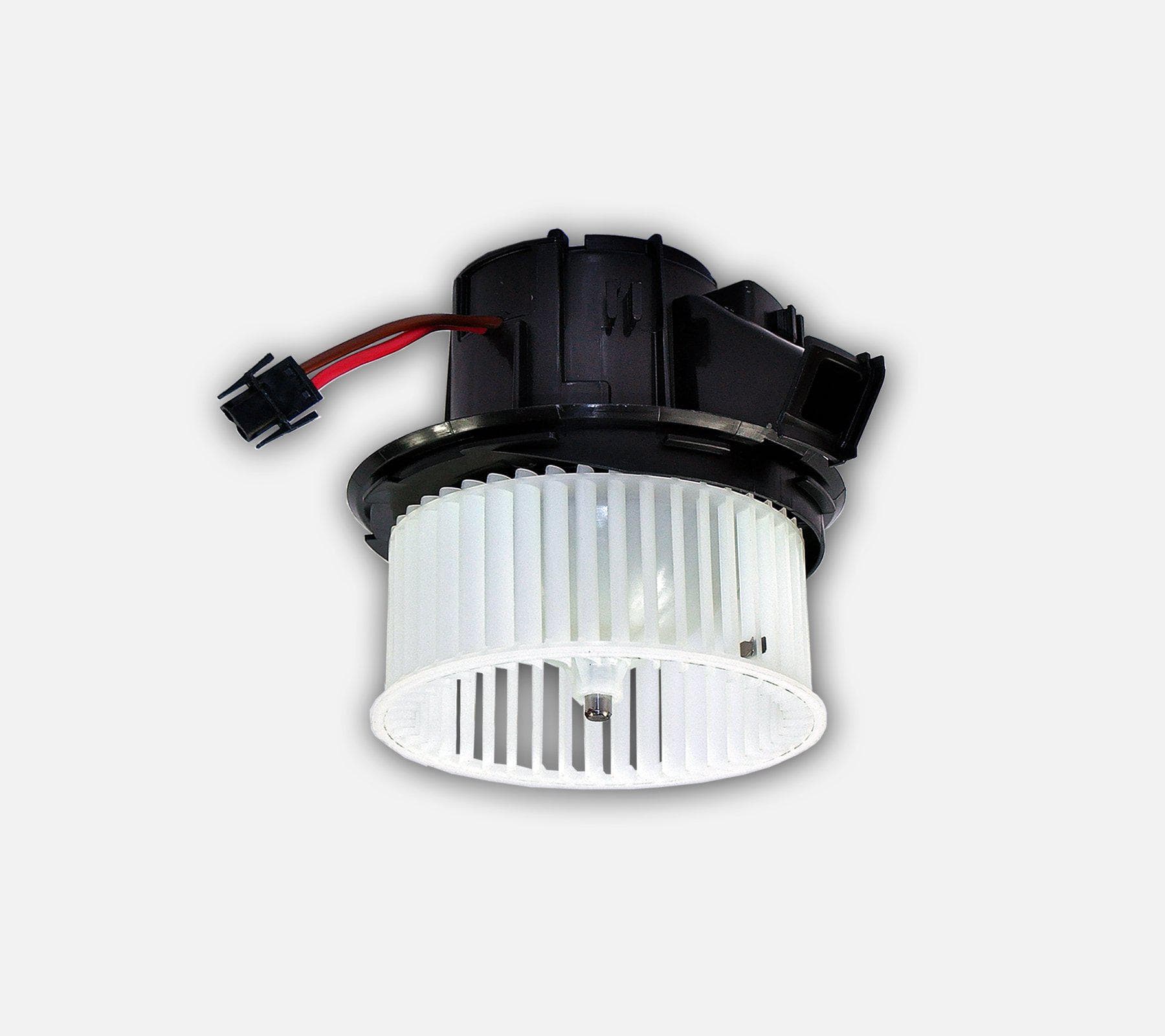 Detail view of blower motor fan housing and connector for Mercedes-Benz heater unit